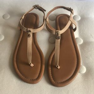 Only worn twice, size 6.5 woman’s tan sandals!